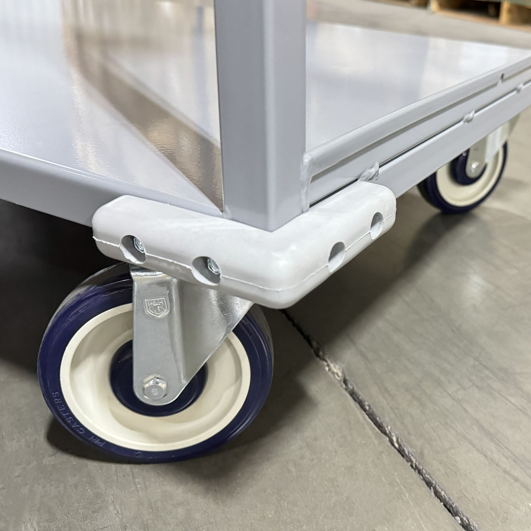 Adhesive. Top step has rough tape and perforated first step aid in stability. With ergonomic handles, dual shelves, and a highly stable six-wheel design, this cart keeps product organized and operators moving efficiently. Add custom accessories like hooks, bins, dividers, or scanner holders to create a tailored solution that fits your operation perfectly.