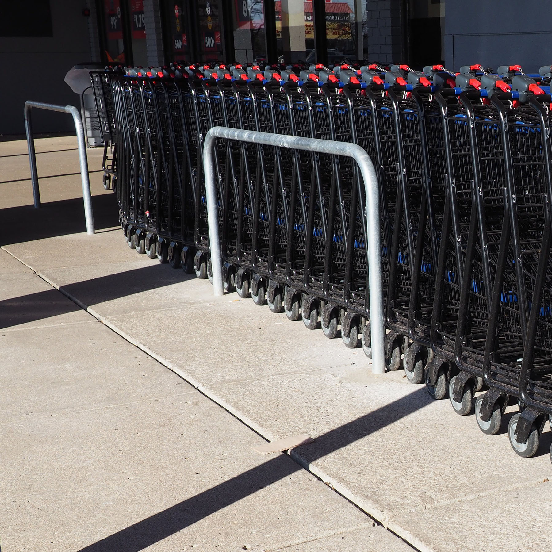 Side Rail - Cart Corral | National Cart #CartCorral #RetailSafety #StoreSolutions #CustomerProtection #DurableDesign #BuiltToLast #SecureStorage #NationalCart