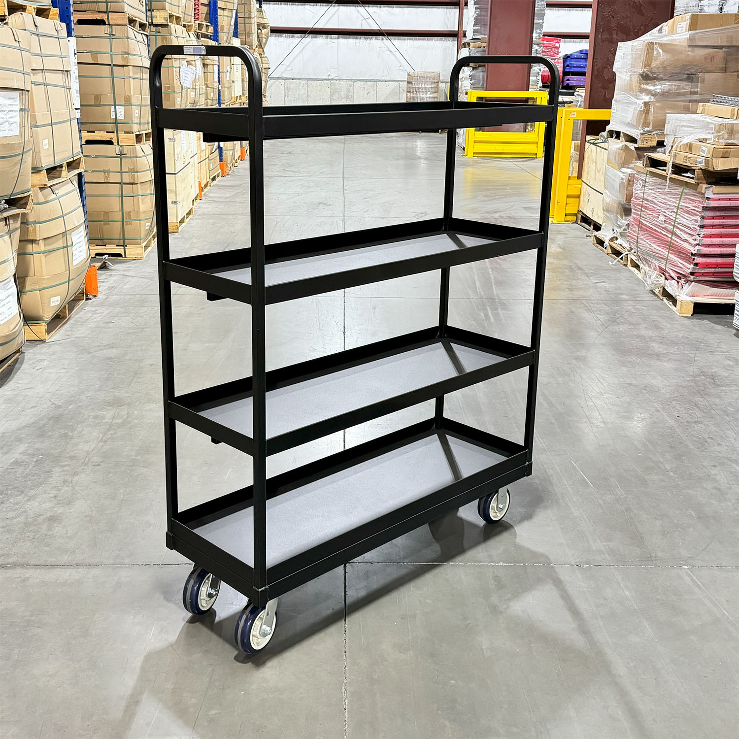 Heavy-Duty Stock Cart material handling picking cart industrial cart distribution cart fulfillment cart Four-shelf swivel cart Raised lip shelves Heavy-duty steel cart All-welded steel construction Stock cart Picking cart Durable utility cart Warehouse cart 360-degree swivel casters Easy maneuverability cart Secure product storage Prevents product damage Increases efficiency Versatile handles Industrial steel cart Mobile storage solution Facility transport cart Heavy-duty transport cart Material handling cart Ergonomic design cart