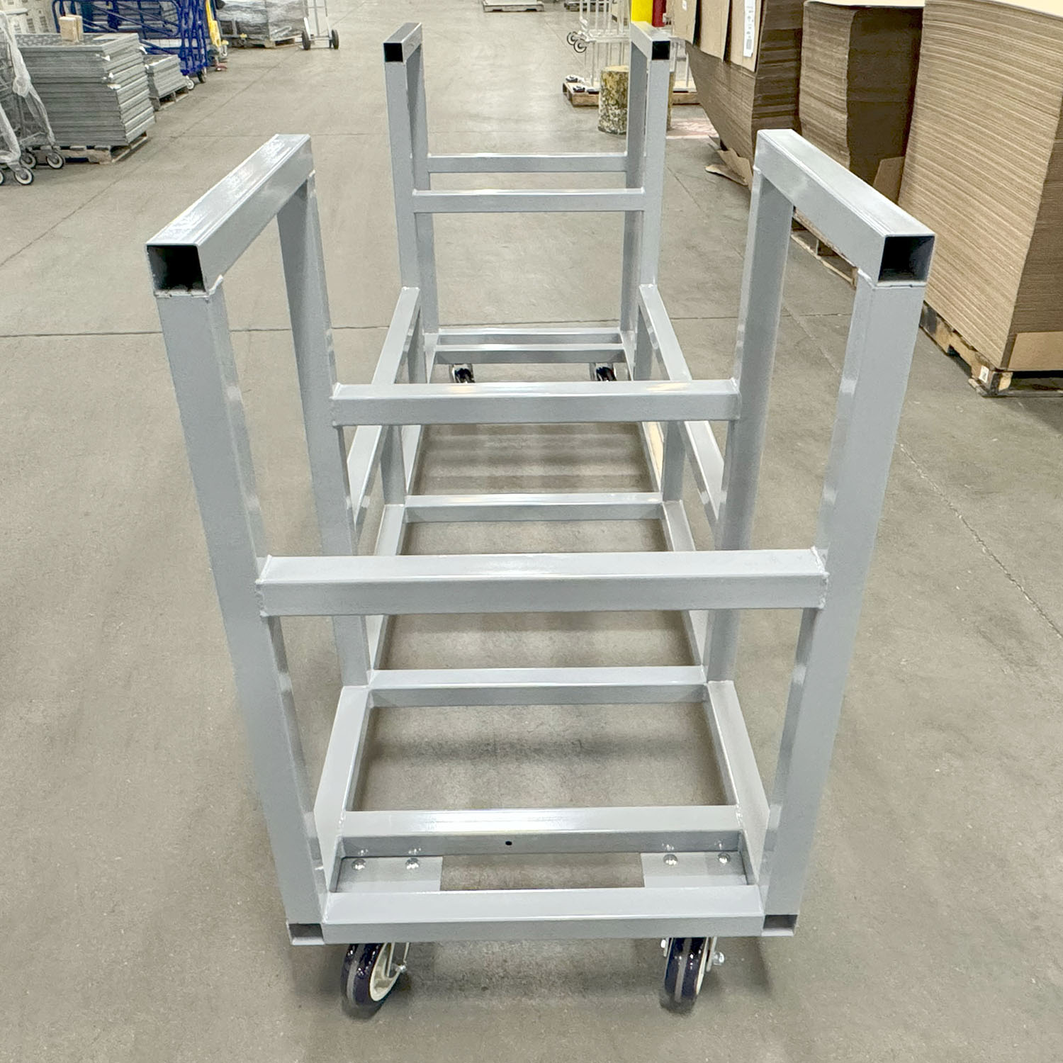 Heavy Item Cart Shelf Cart Walkie Rider Pick Cart Heavy-duty steel pockets Forklift compatible cart Polyurethane wheels Phenolic wheels Manpowered cart Bulk item cart Durable cart Steel construction cart Powder coat finish Raised edge shelves Vertical tubes containment Large handle cart 4-wheel cart Easy mobility cart Versatile cart Increased productivity cart Fully assembled cart