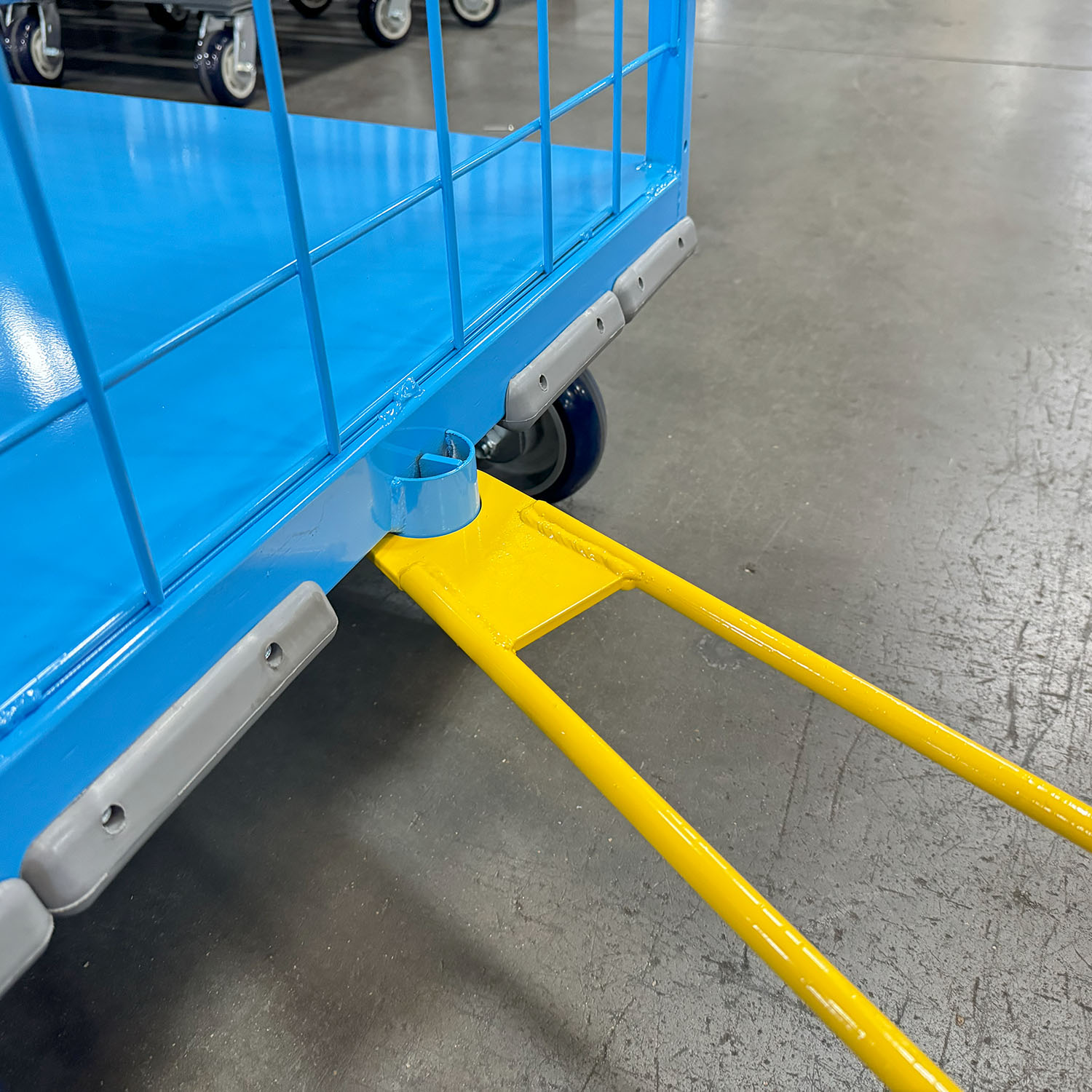 Spring-Loaded Tow Bar: The spring-loaded tow bar is a crucial feature that enhances the cart's maneuverability and ease of use. It allows the cart to be easily attached to a tugger or tow vehicle for transportation within the warehouse or distribution center. The spring-loaded mechanism ensures smooth coupling and decoupling, reducing strain on the operator and minimizing the risk of accidents.