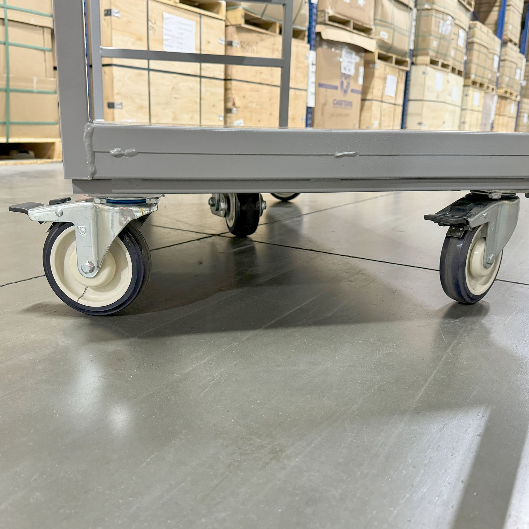 industrial utility cart, warehouse cart with shelves, heavy-duty material handling cart, steel utility cart, rolling warehouse cart, industrial storage cart, workshop cart, material transport cart