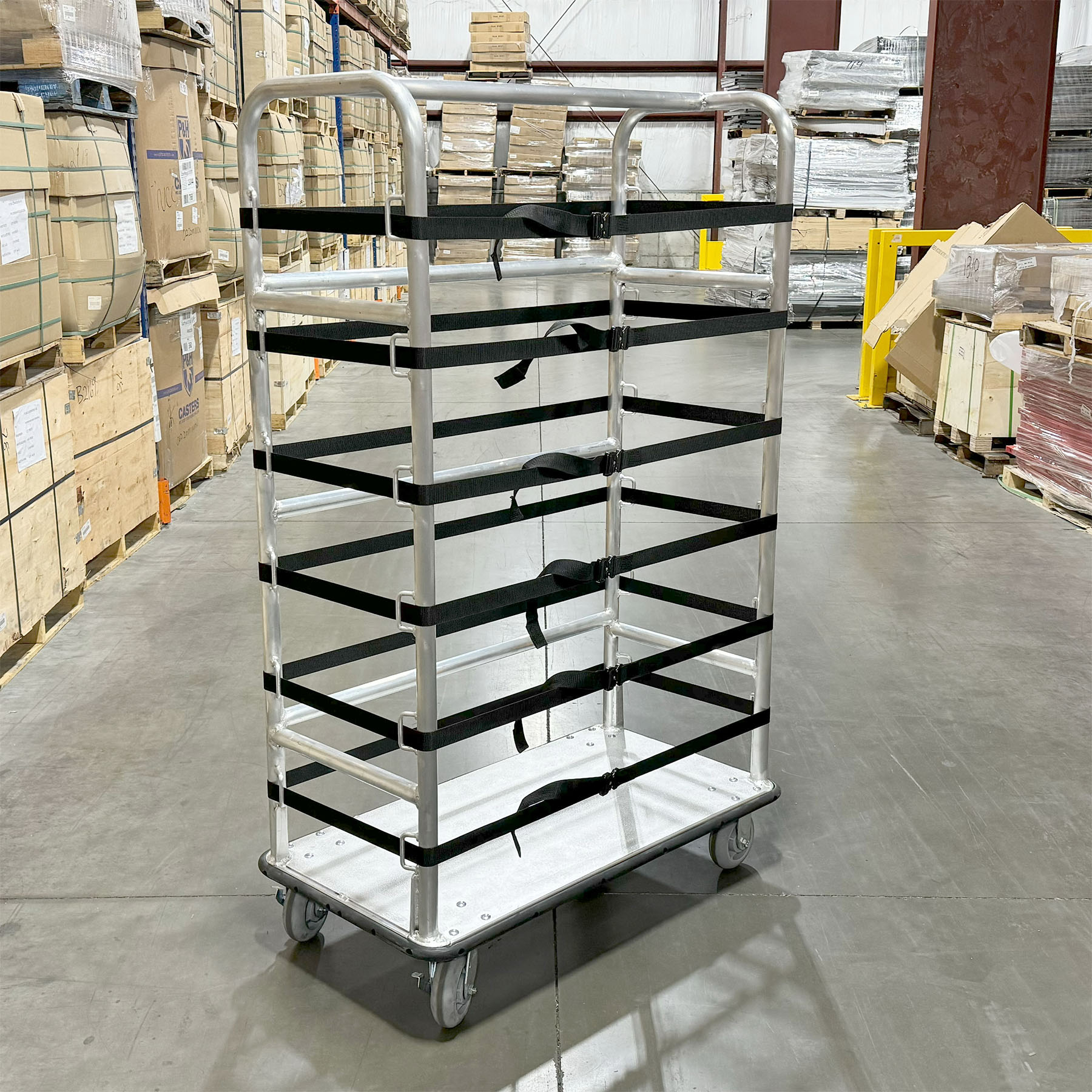 Material handling cart Adjustable strap cart Durable warehouse cart Aluminum frame cart Smooth-rolling casters Industrial transportation equipment Warehouse material handling Secure load cart Multi-purpose warehouse cart