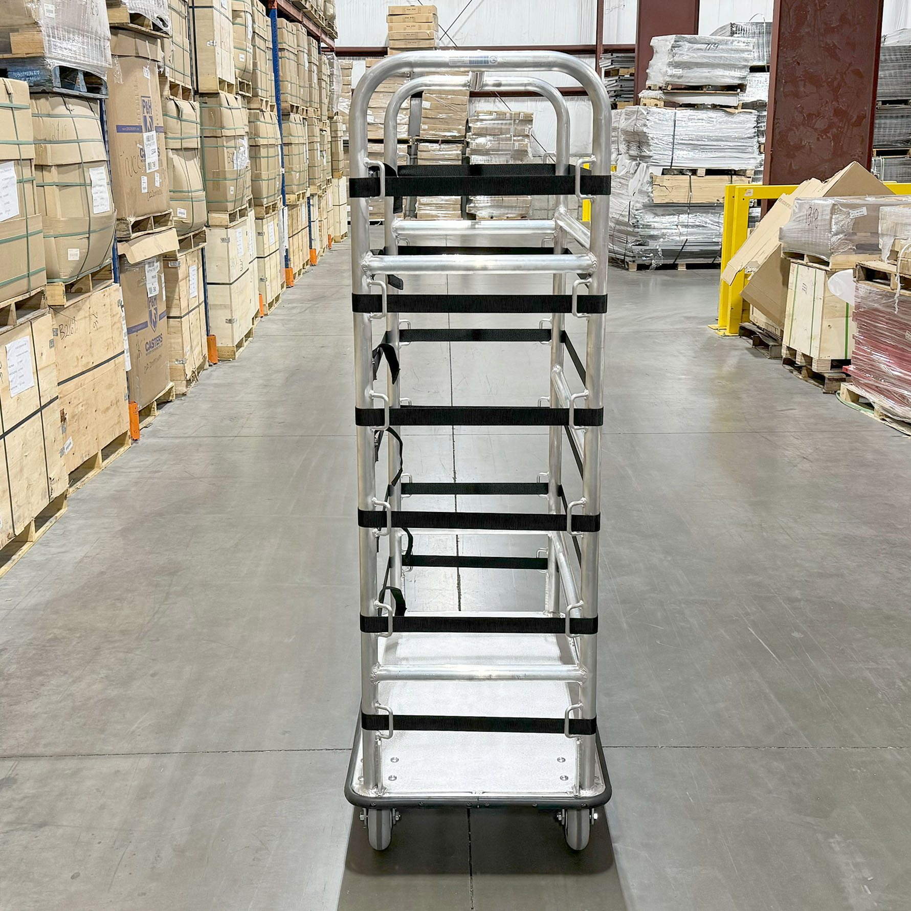 Material handling cart Adjustable strap cart Durable warehouse cart Aluminum frame cart Smooth-rolling casters Industrial transportation equipment Warehouse material handling Secure load cart Multi-purpose warehouse cart