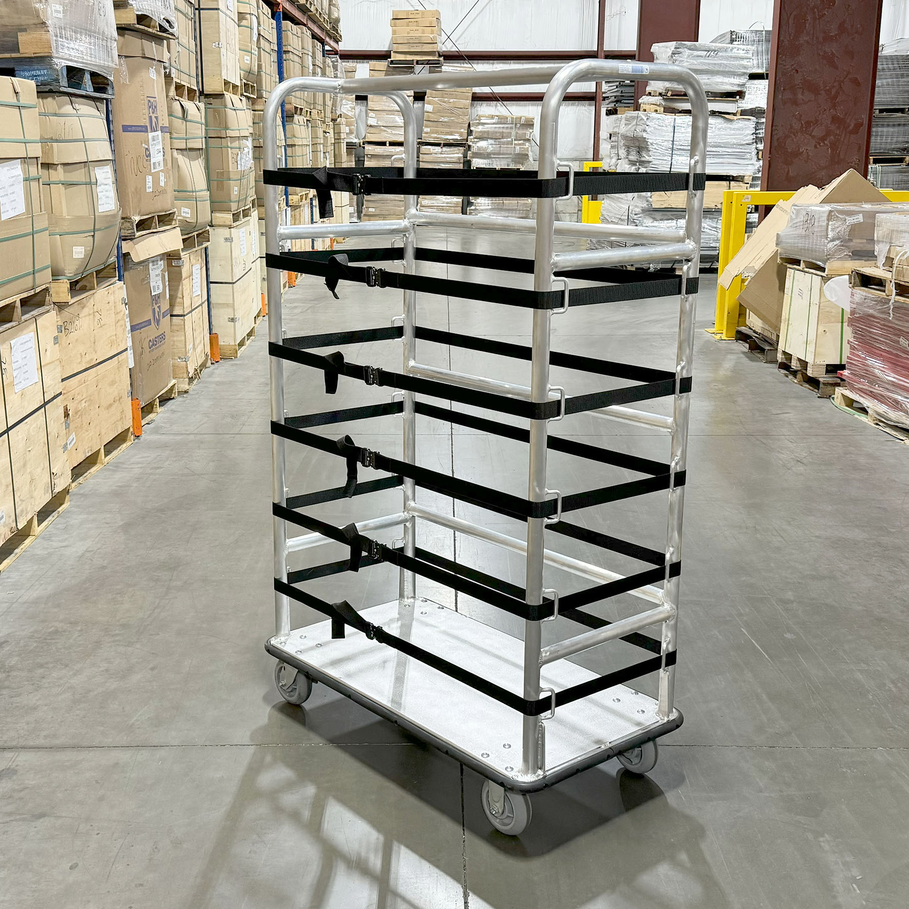 Material handling cart Adjustable strap cart Durable warehouse cart Aluminum frame cart Smooth-rolling casters Industrial transportation equipment Warehouse material handling Secure load cart Multi-purpose warehouse cart