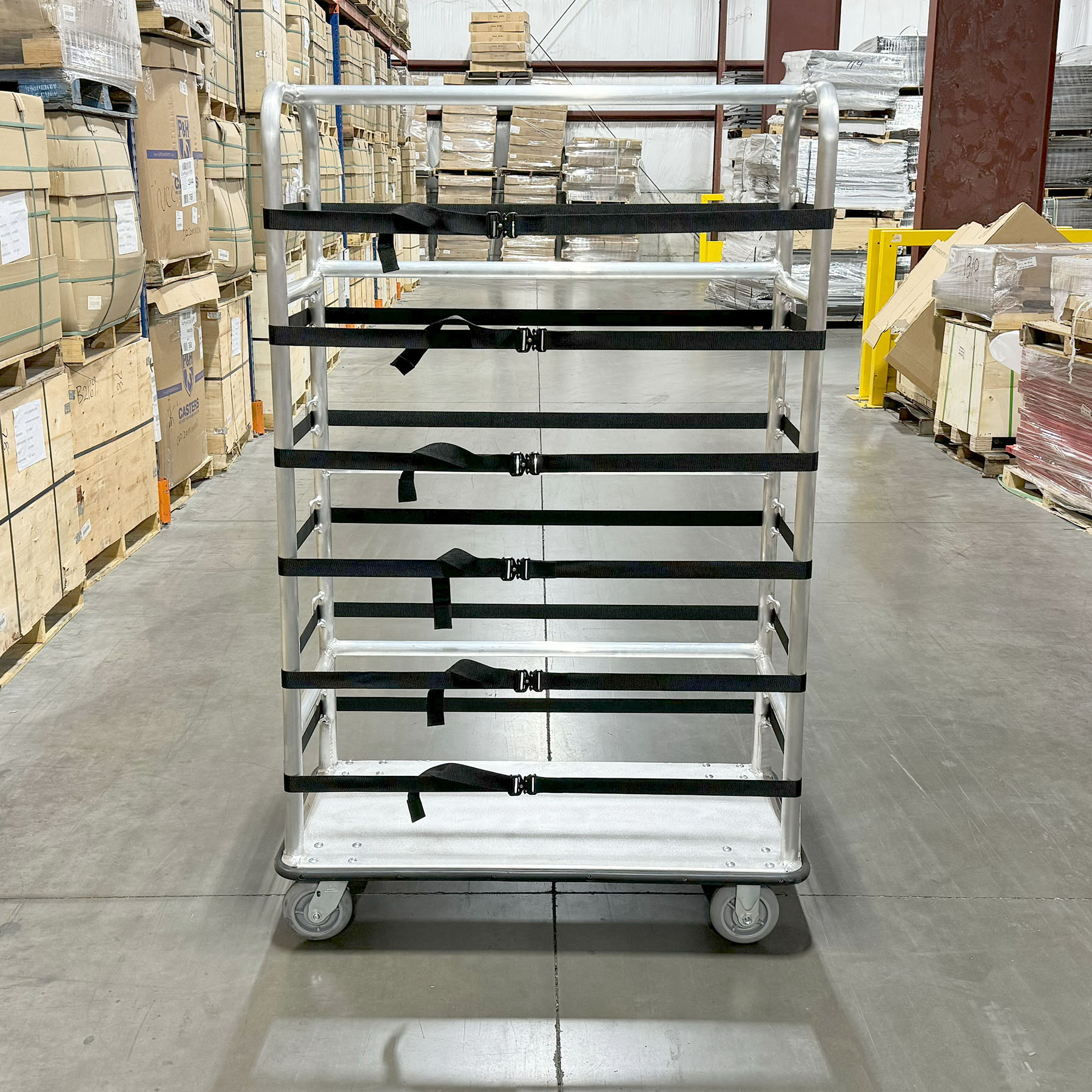 Material handling cart Adjustable strap cart Durable warehouse cart Aluminum frame cart Smooth-rolling casters Industrial transportation equipment Warehouse material handling Secure load cart Multi-purpose warehouse cart